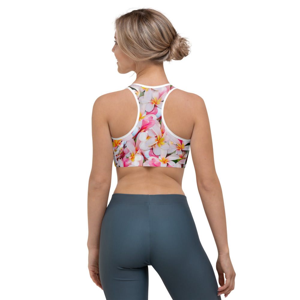 Sports bra crop top for running, walking, gym and yoga in tropical frangipanidesign