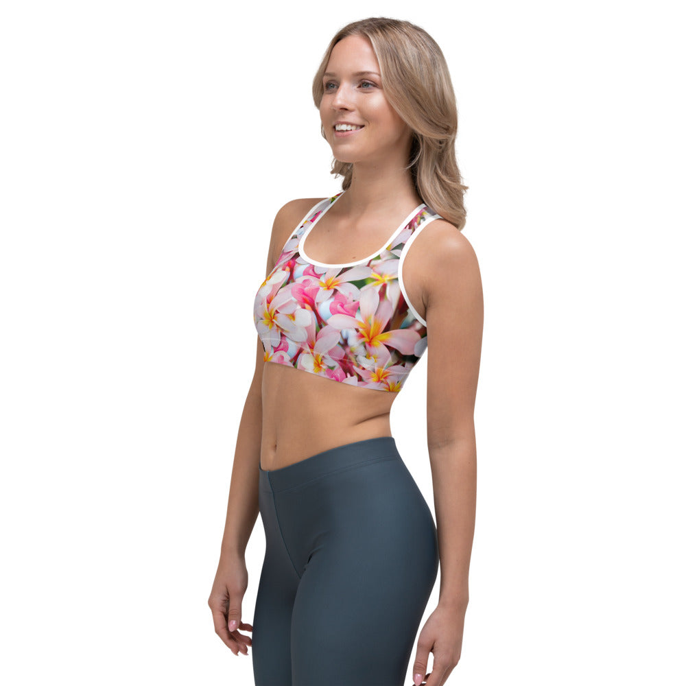 Sports bra crop top for running, walking, gym and yoga in tropical frangipanidesign