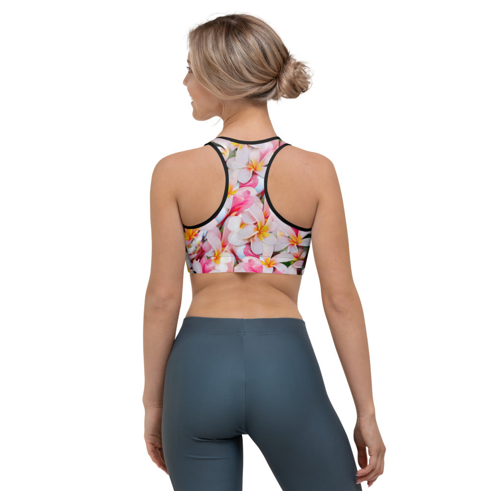 Sports bra crop top for running, walking, gym and yoga in tropical frangipanidesign